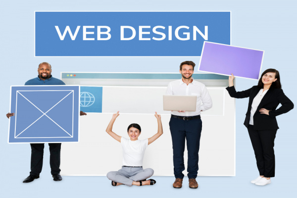 four people holding banners for web design